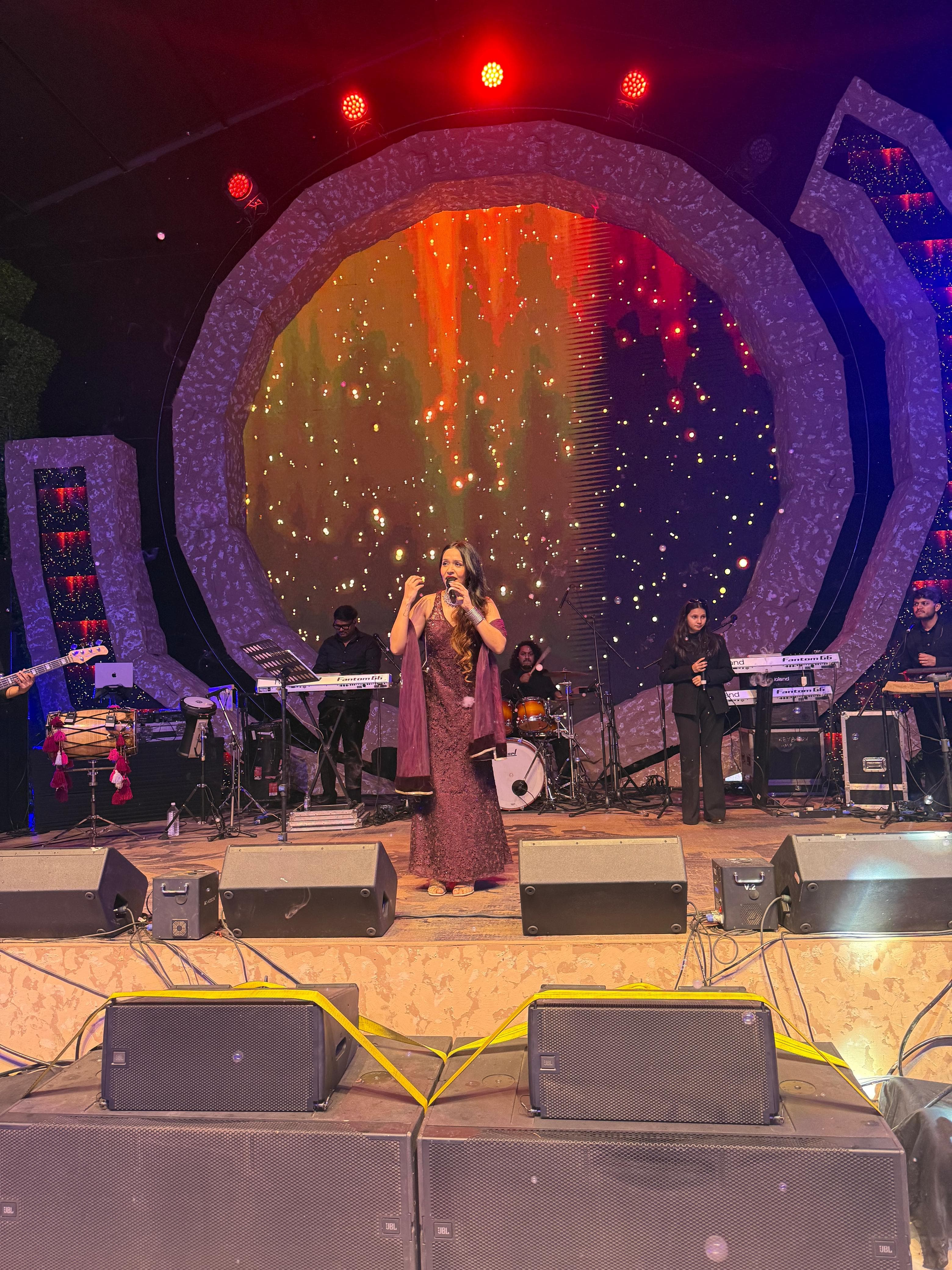 Aishwarya Anand in performance attire at a formal music event